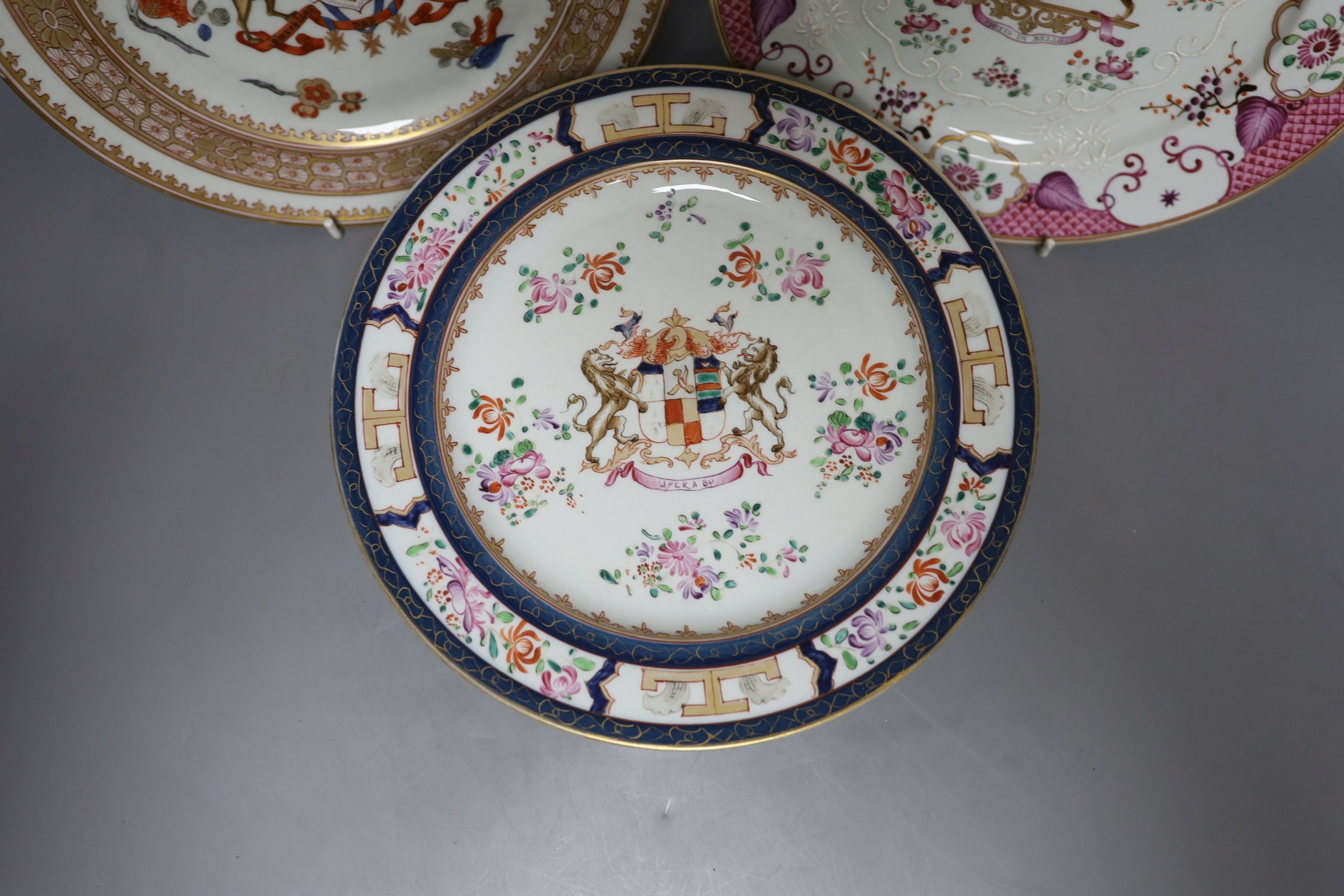 A collection of seven Chinese export armorial porcelain plates by Samson of Paris